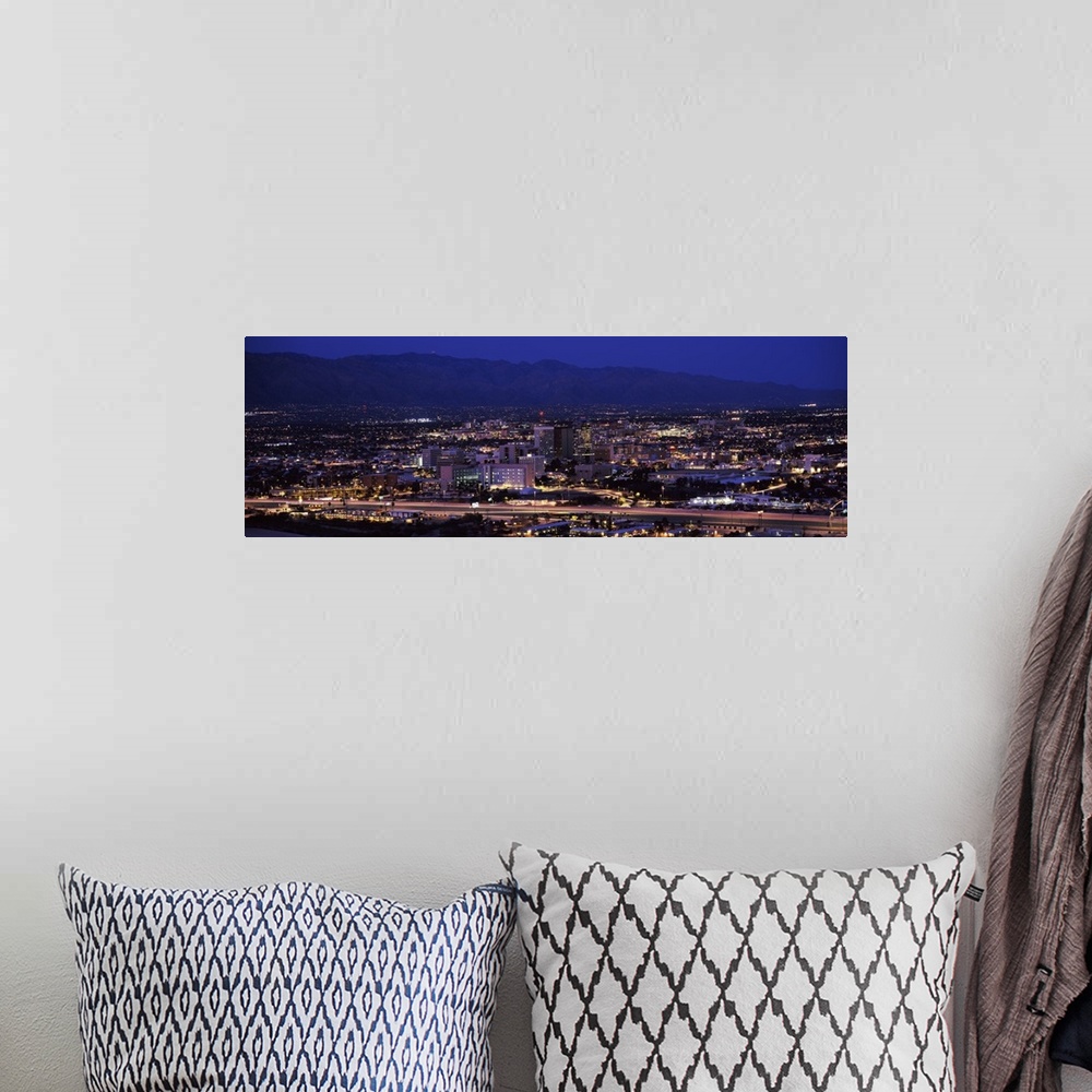 A bohemian room featuring Aerial view of a city at night Tucson Pima County Arizona