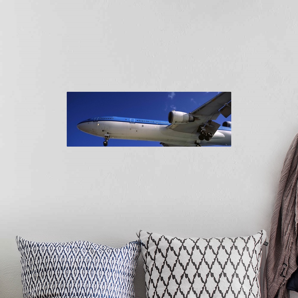 A bohemian room featuring An airplane in flight, Princess Juliana International Airport, Maho Beach, Sint Maarten, Netherla...