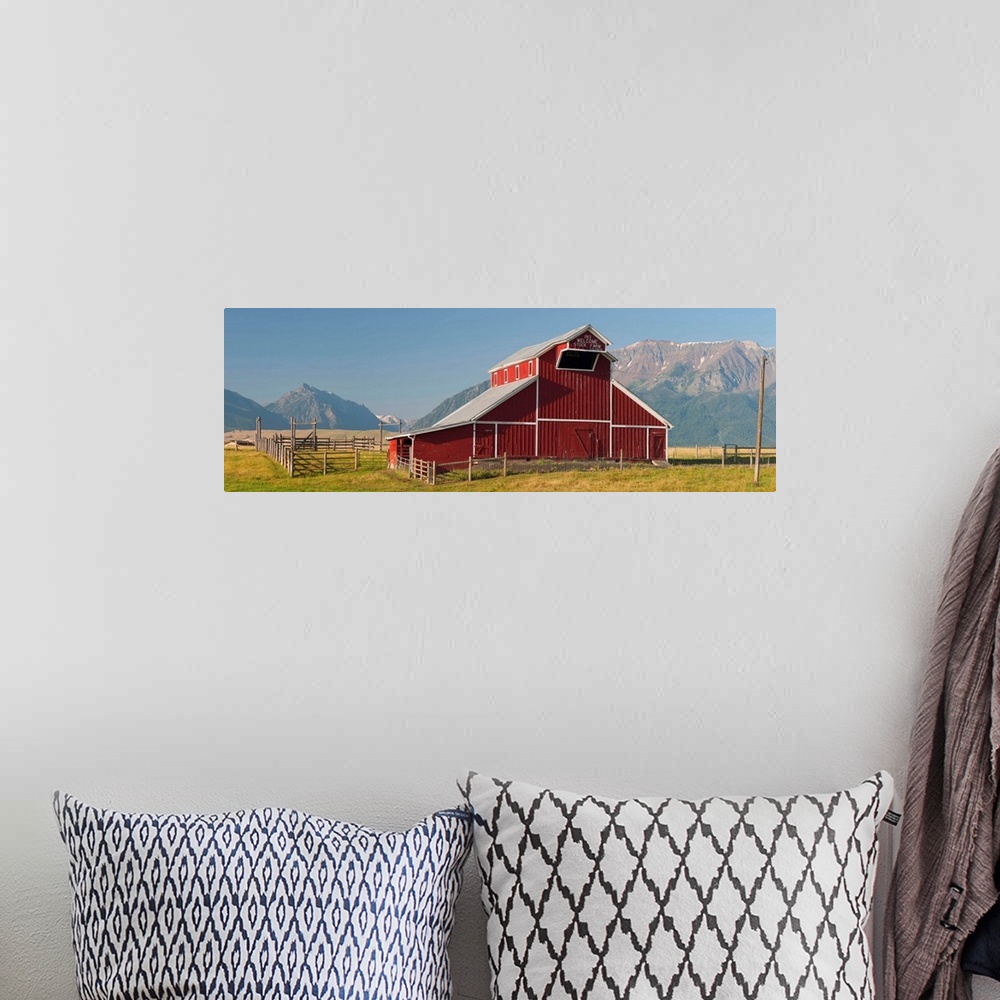 A bohemian room featuring Barn in a field with Wallowa Mountains in background, Enterprise, Oregon