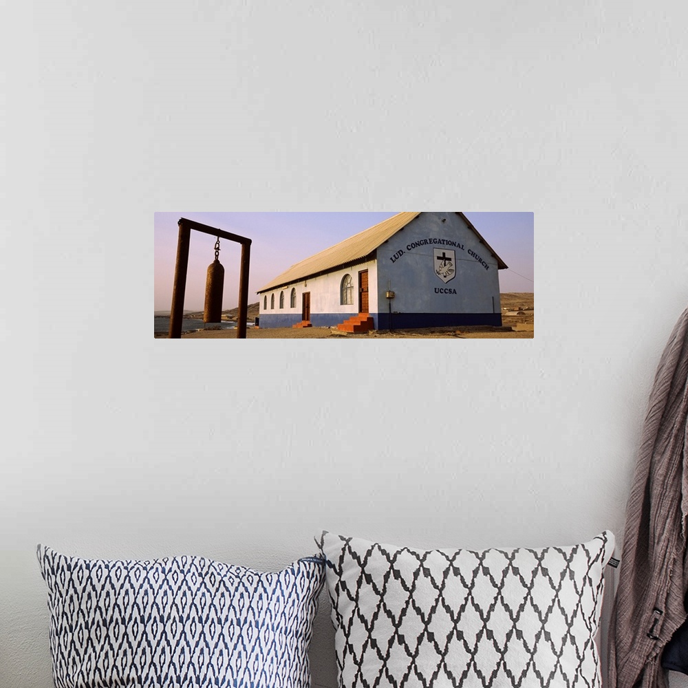 A bohemian room featuring Bell in front of a church Luderitz Karas Region Namibia