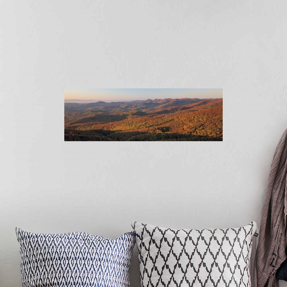 A bohemian room featuring Panorama of sunlight falling on the rolling hills along the Blue Ridge Parkway in North Carolina.