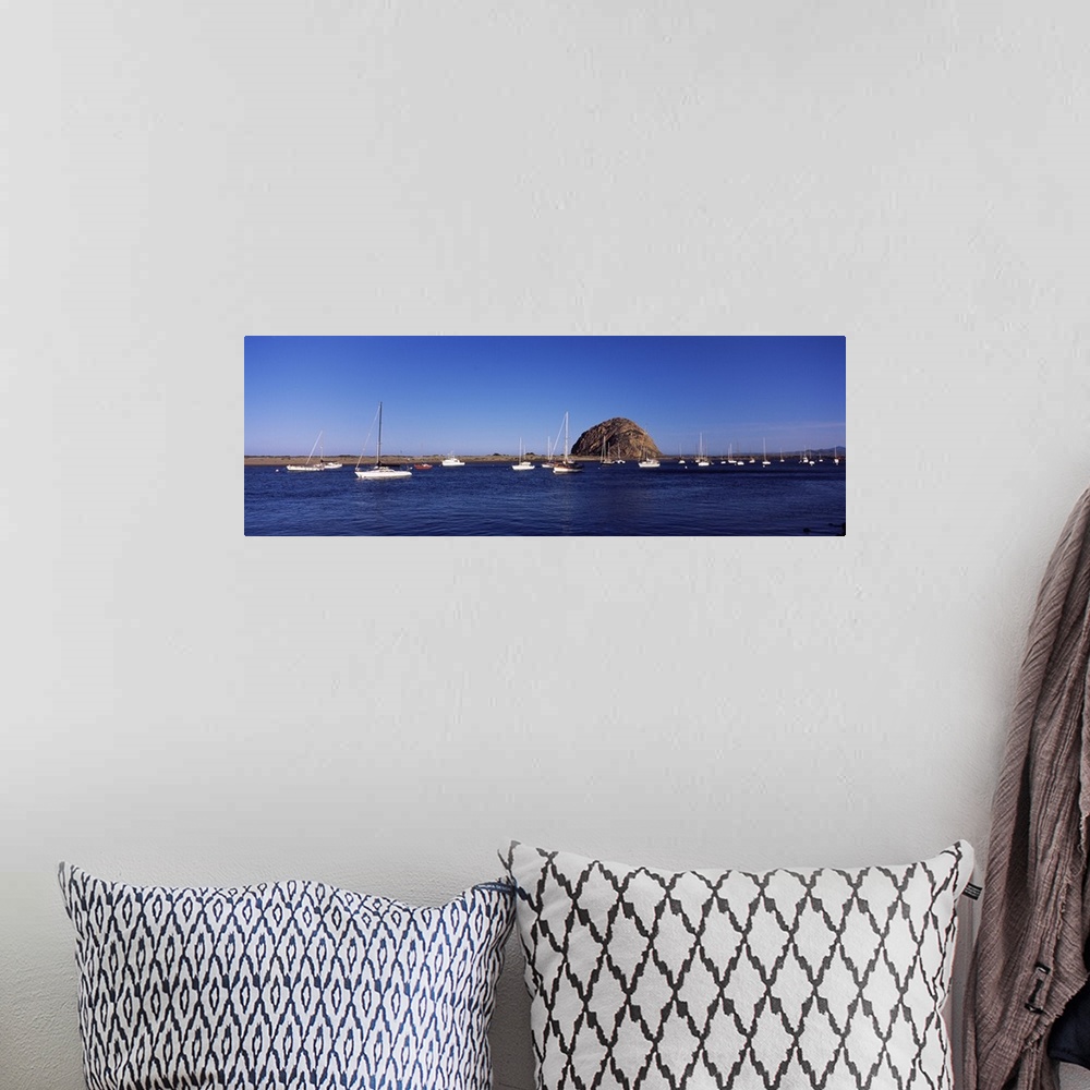 A bohemian room featuring Boats at a harbor with rock in the background Morro Rock Morro Bay California
