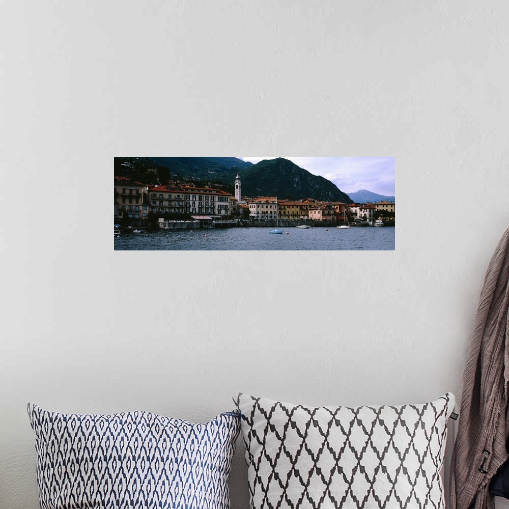 A bohemian room featuring Buildings at the lakeside viewed from a ferry, Lake Como, Menaggio, Como, Lombardy, Italy