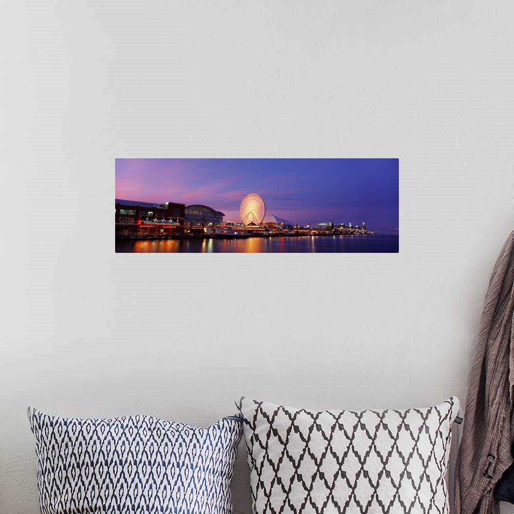 A bohemian room featuring Panoramic photo on canvas of buildings lit up along the waterfront in Chicago with a ferris wheel.