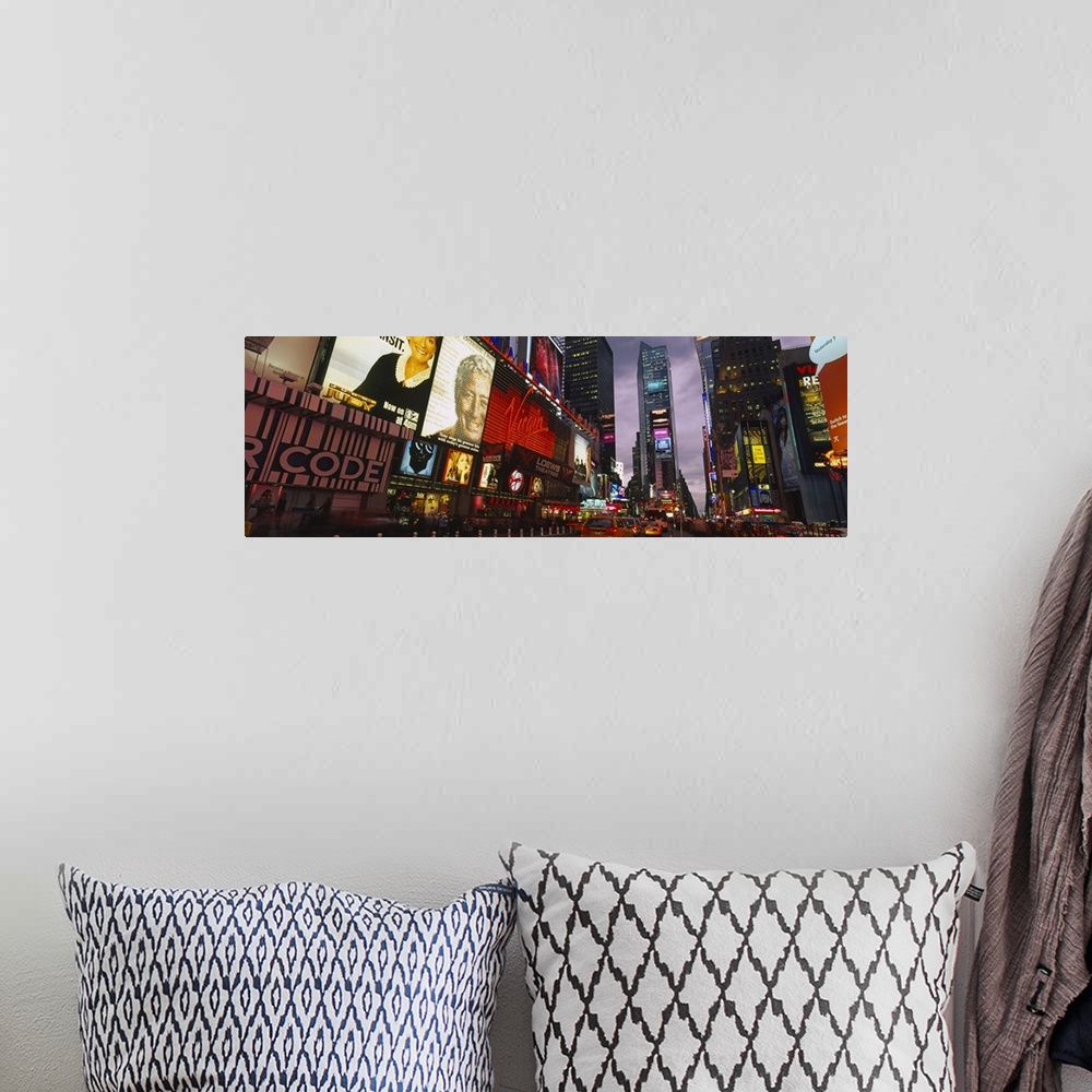 A bohemian room featuring This wall hanging for a home or office is a panoramic photograph taken at street level of the eno...
