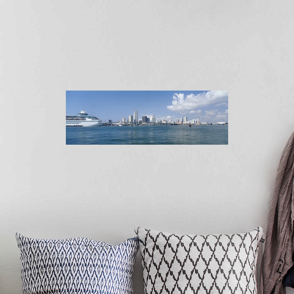 A bohemian room featuring Panoramic view of Miami Florida's Biscayne Bay waterfront with ship on the water.
