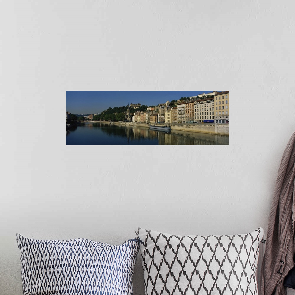 A bohemian room featuring Buildings on the waterfront, Saone River, Lyon, France