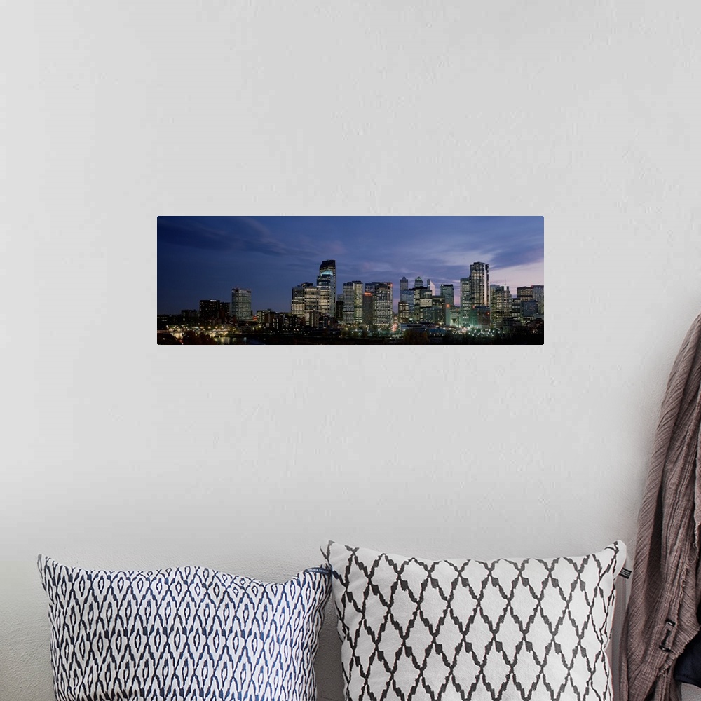A bohemian room featuring Canada, Alberta, Calgary, Crescent Drive, Skyscrapers in a city at sunset