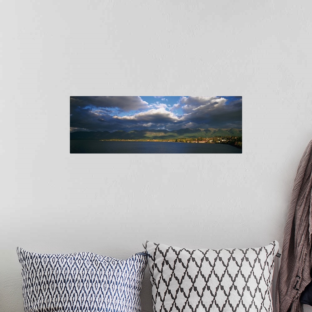 A bohemian room featuring Clouded sky over a lake, Flathead Lake, Swan Range, Polson, Montana
