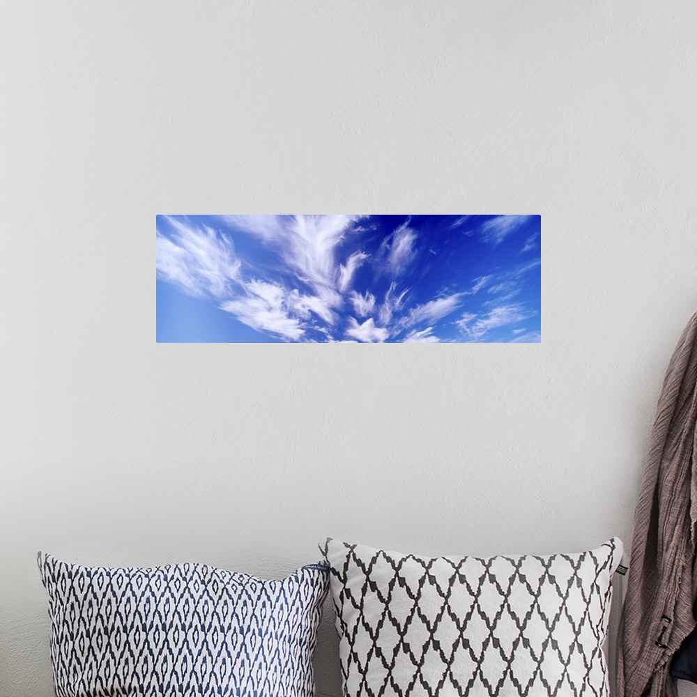 A bohemian room featuring clouds