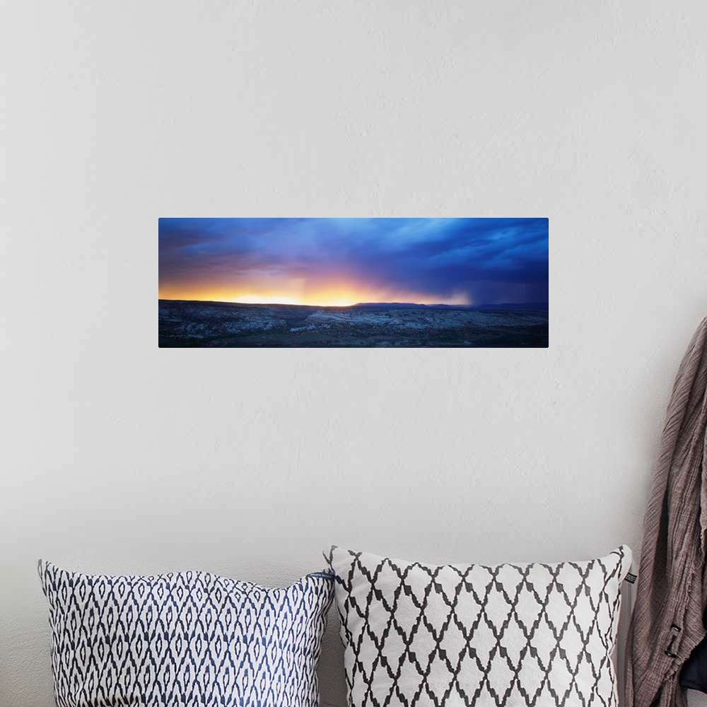 A bohemian room featuring Clouds and Sunset