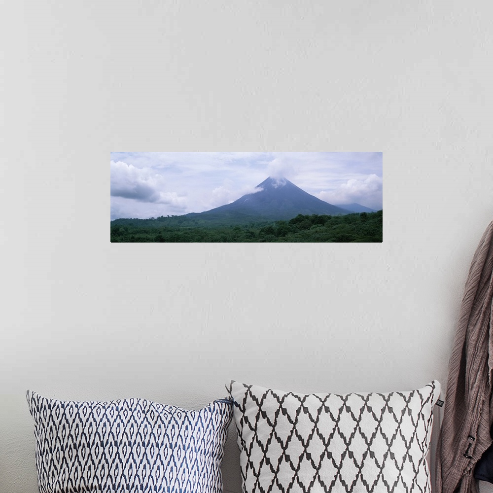 A bohemian room featuring Clouds over a mountain peak Arenal Volcano Alajuela Province Costa Rica
