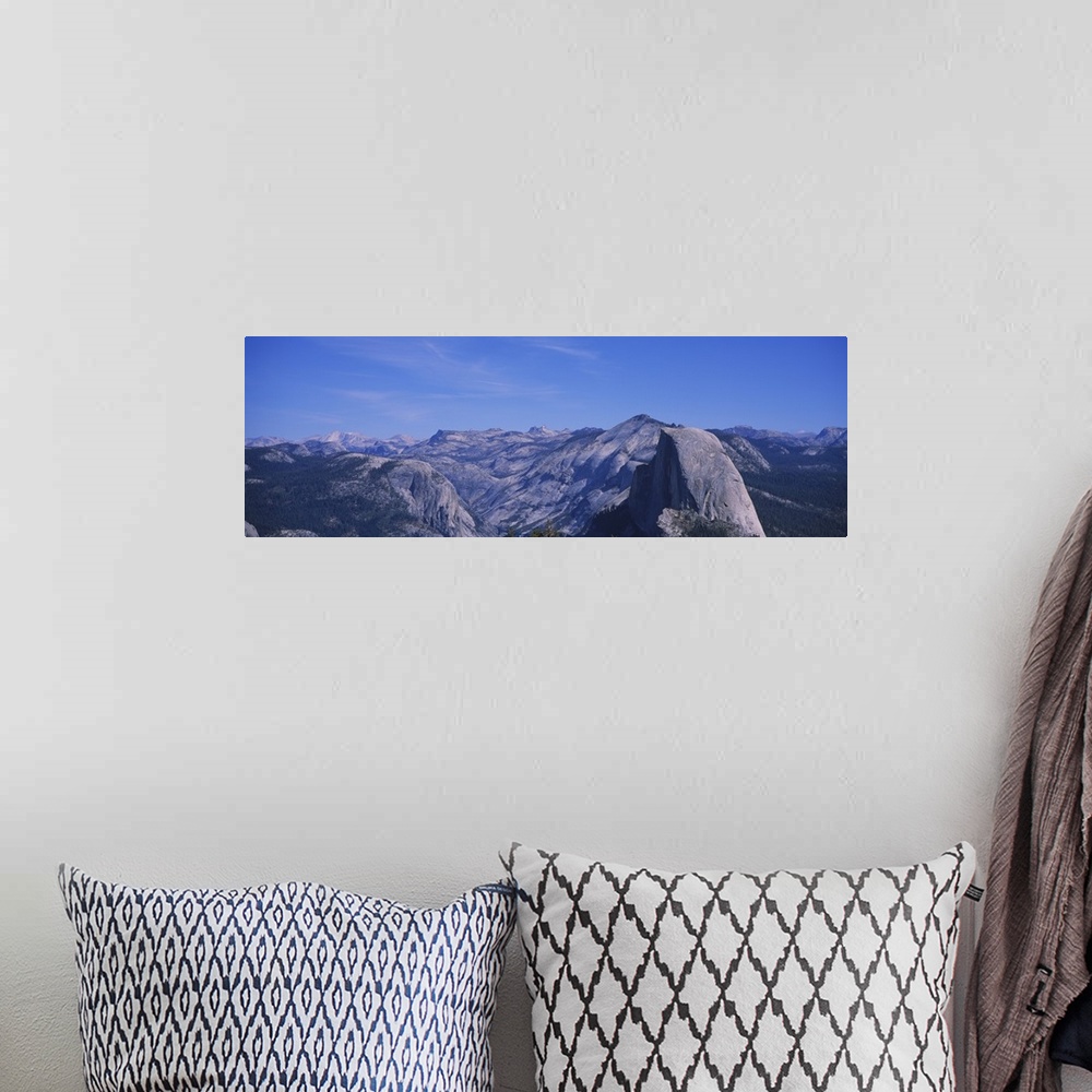 A bohemian room featuring Clouds over a mountain range, Yosemite National Park, California