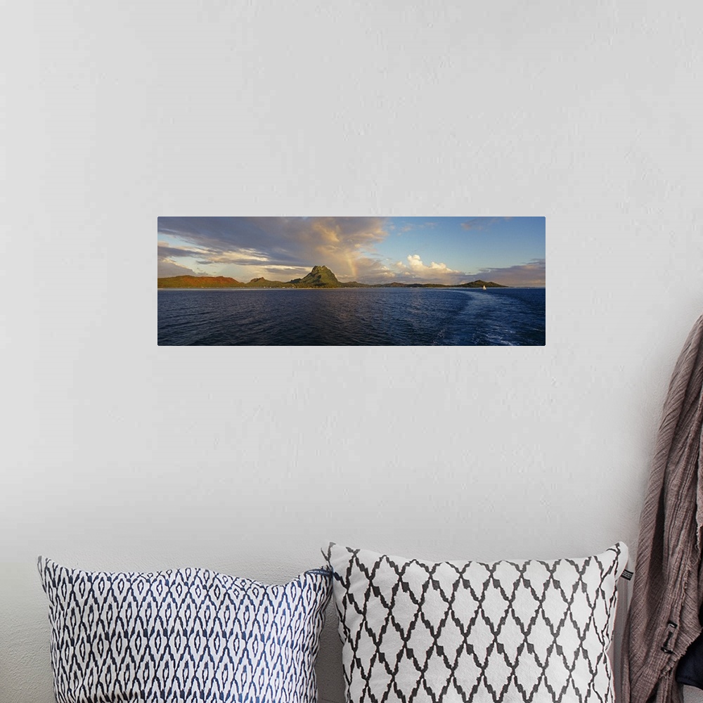 A bohemian room featuring Clouds over an island, Bora Bora, French Polynesia