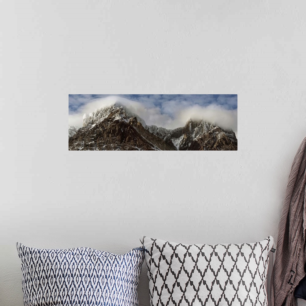 A bohemian room featuring Clouds over Snowcapped mountain range, Magallanes Region, Patagonia, Chile