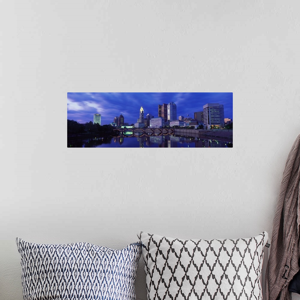 A bohemian room featuring Panoramic photo of downtown Columbus, Ohio with the tall buildings and lit  up bridge reflecting ...