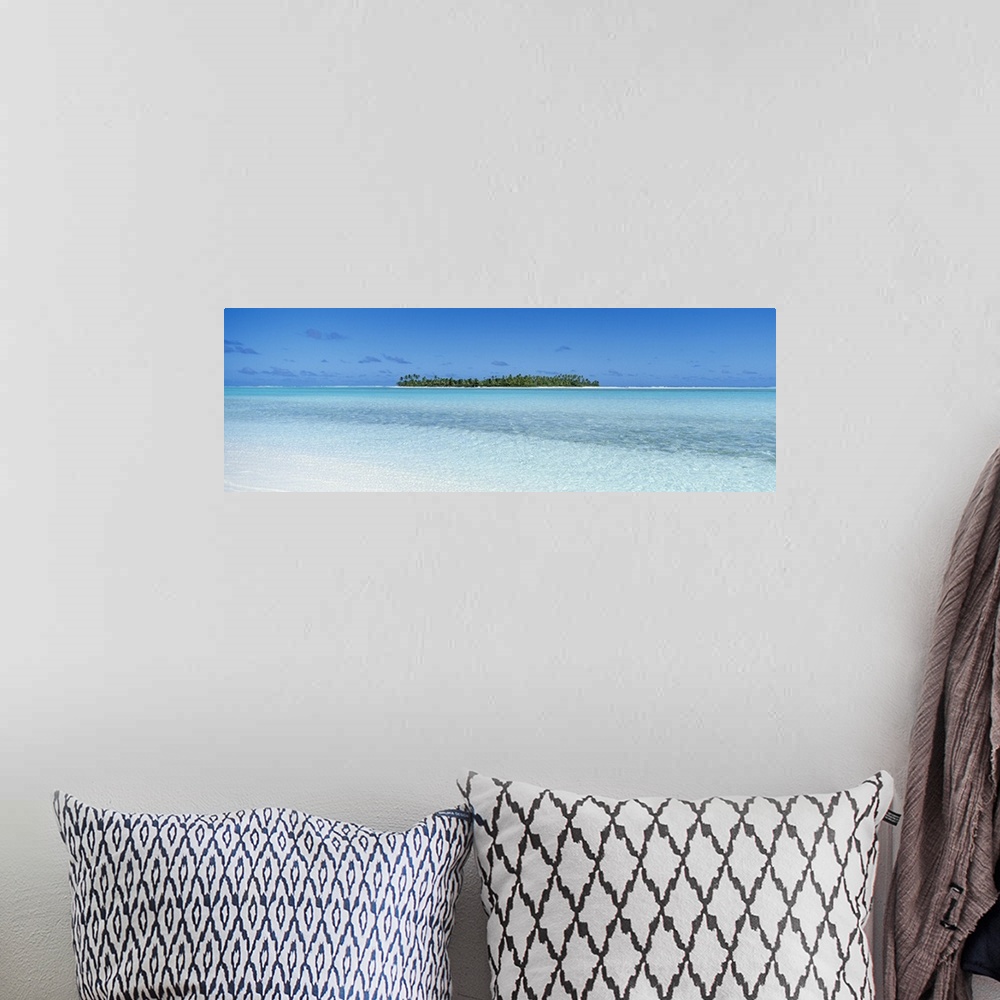 A bohemian room featuring Panoramic photograph on a big canvas of the clear blue waters of the South Pacific, the Cook Isla...