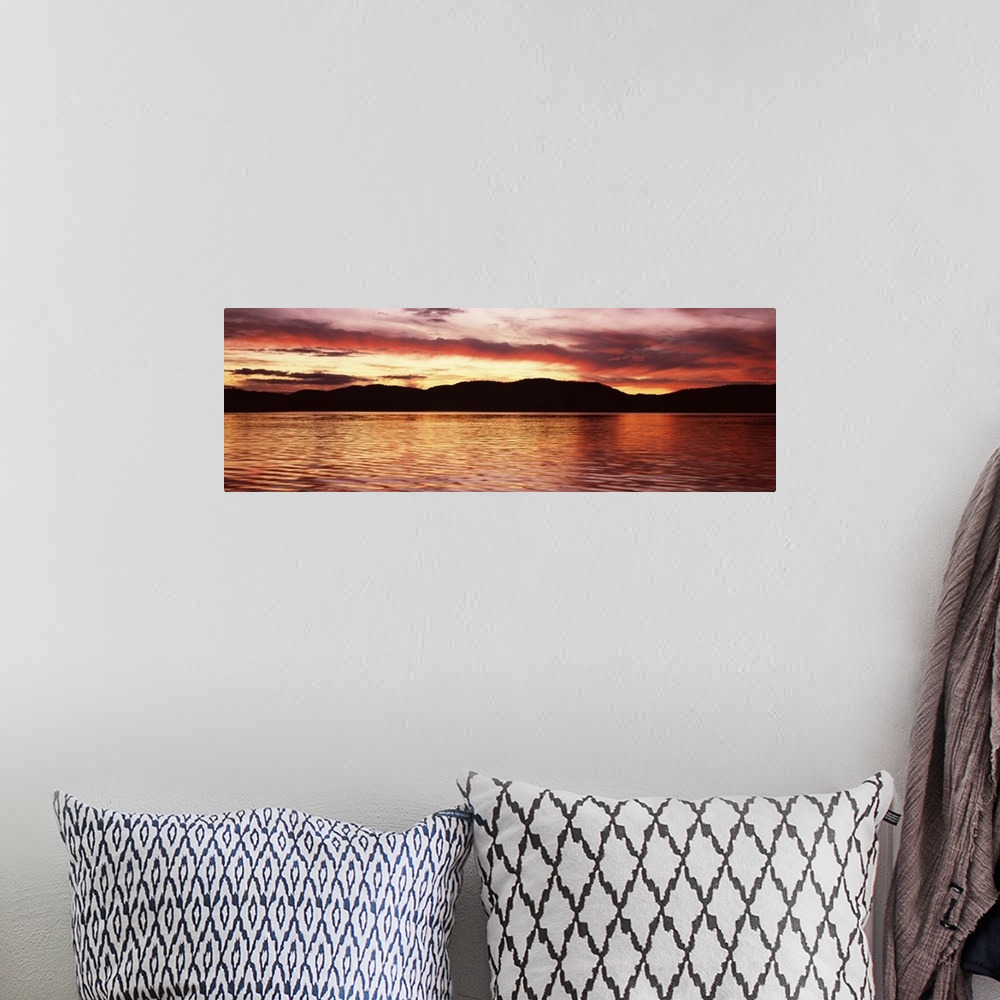A bohemian room featuring Sunset over Fourth Lake from Inlet in the Adirondack Mountains, New York
