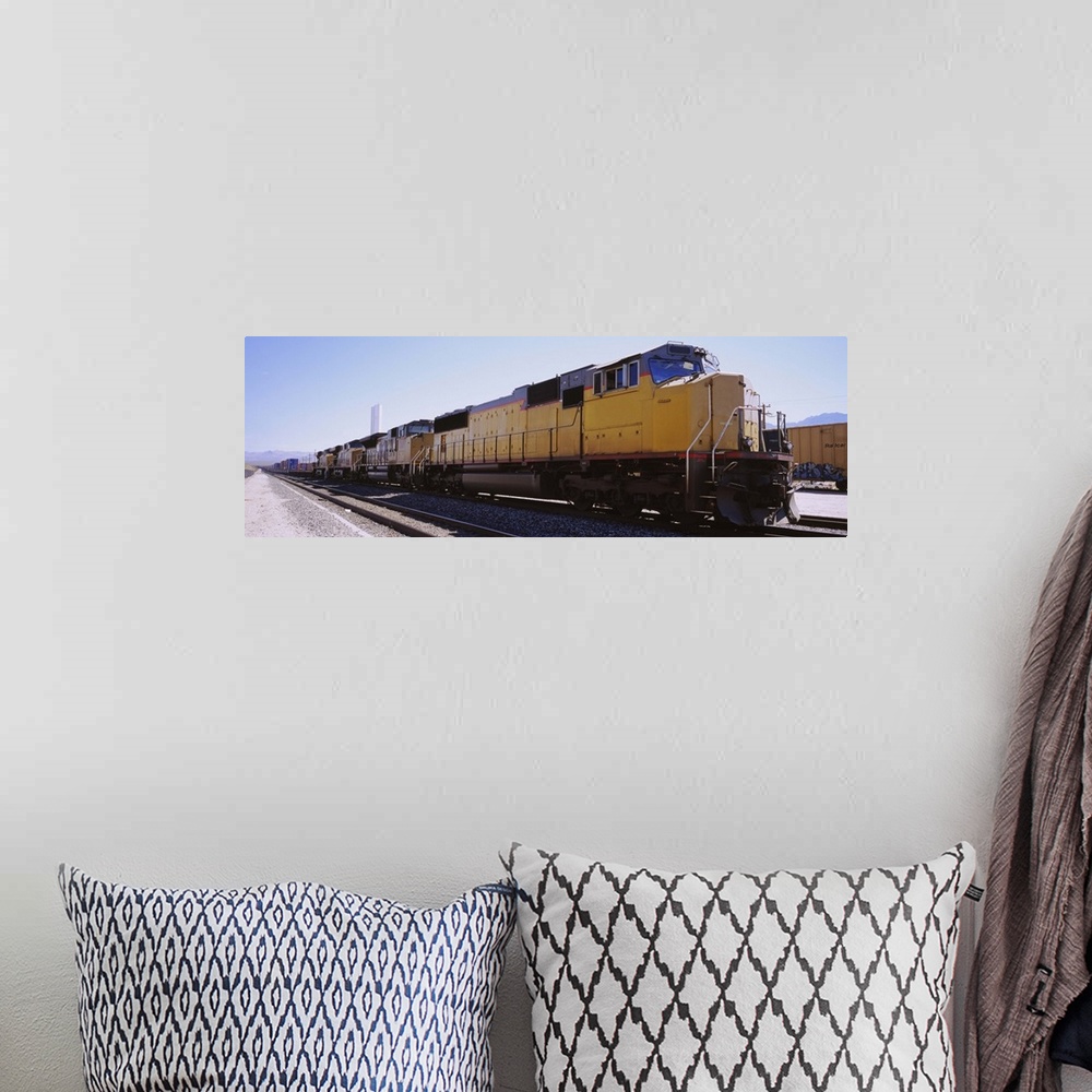 A bohemian room featuring Freight train on railroad tracks, California