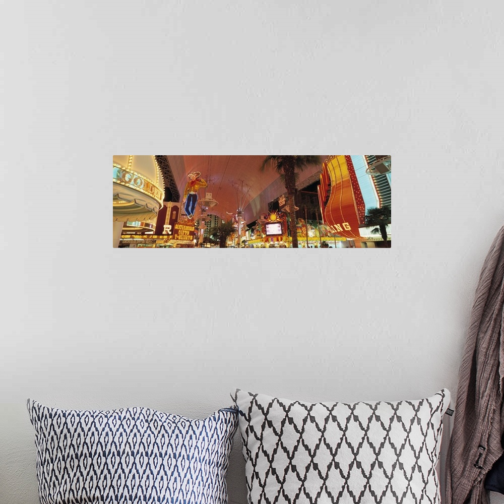 A bohemian room featuring Horizontal photo of the Las Vegas Strip lit up from street view.