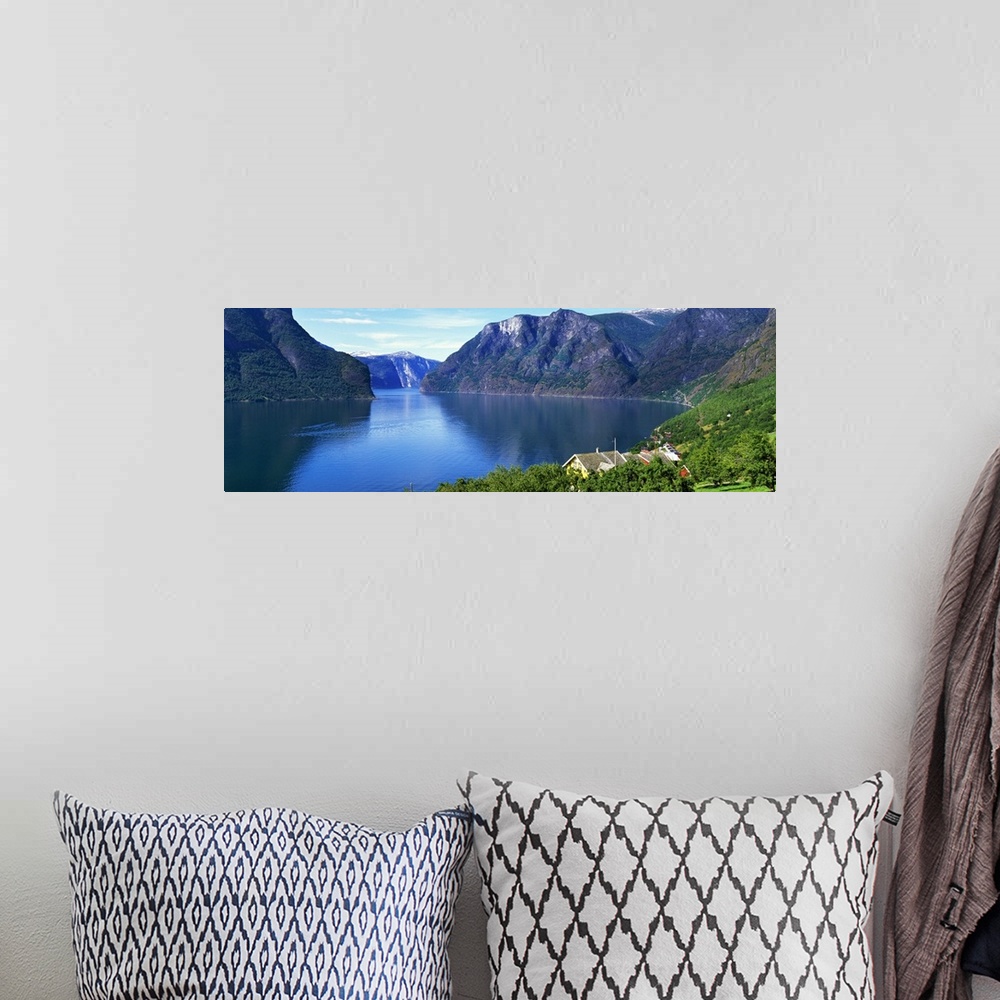 A bohemian room featuring Grassy hillside along Norwegian fjord, Norway