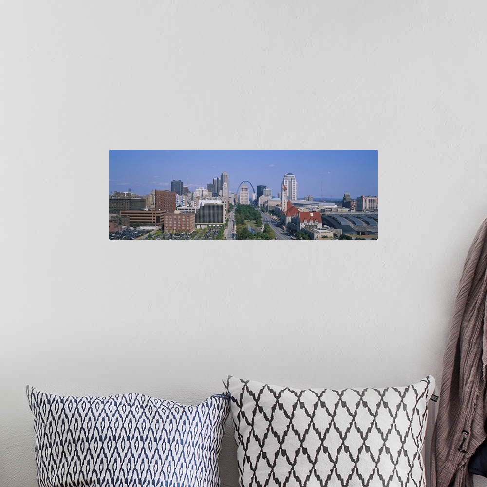 A bohemian room featuring Panoramic, high angle photograph of the St. Louis skyline during the day, the Gateway Arch can be...