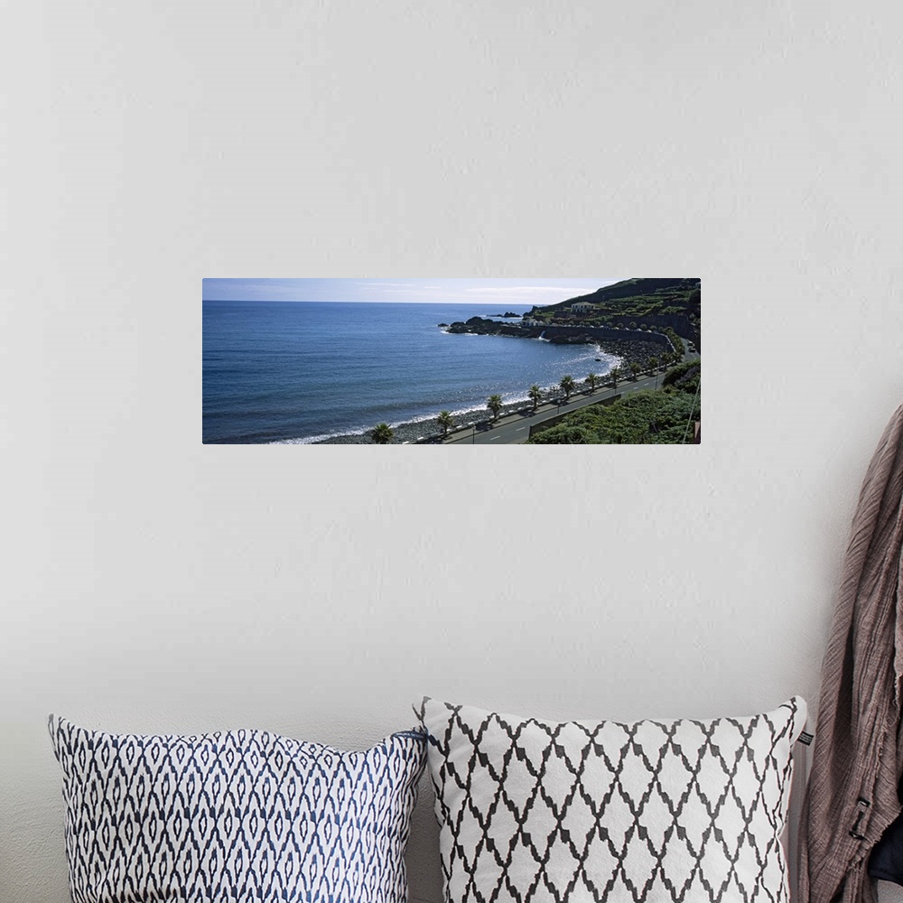 A bohemian room featuring High angle view of a road along the coast, Seixal, Madeira, Portugal