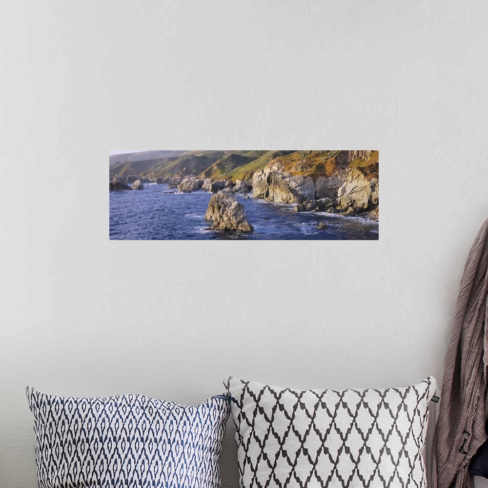 A bohemian room featuring High angle view of rock formations on the coast, Big Sur, Garrapata State Beach, Monterey Coast, ...