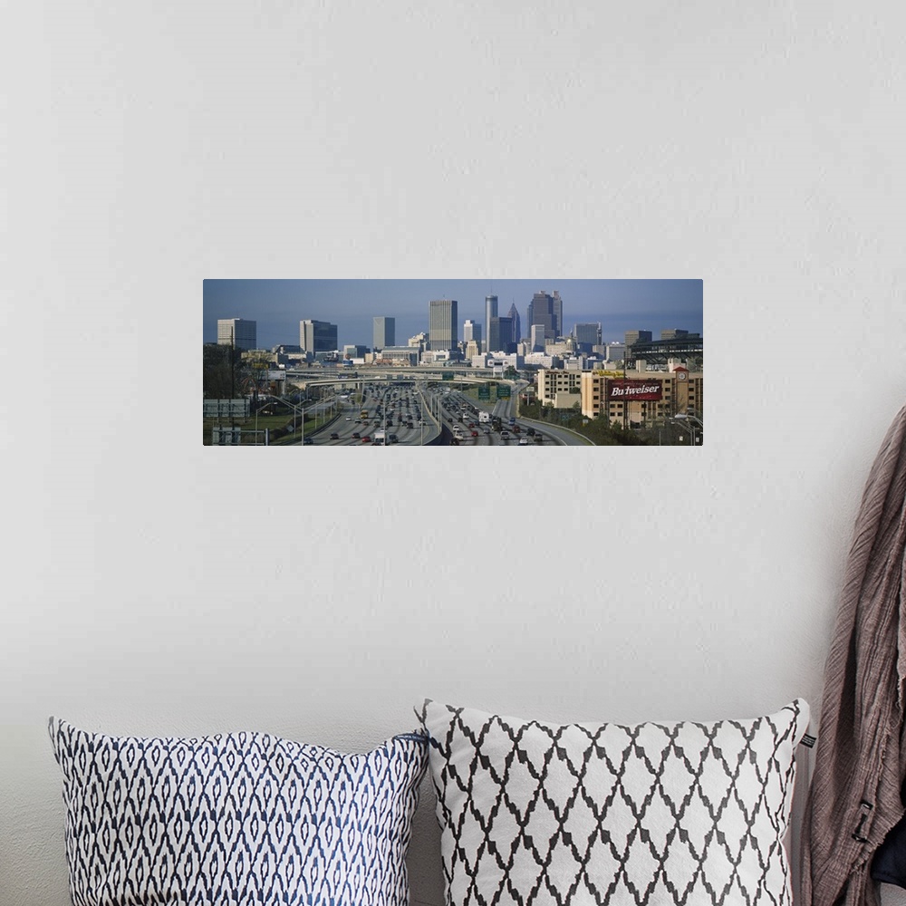 A bohemian room featuring Wide angle view of the skyline and roads leading into the city of Atlanta.