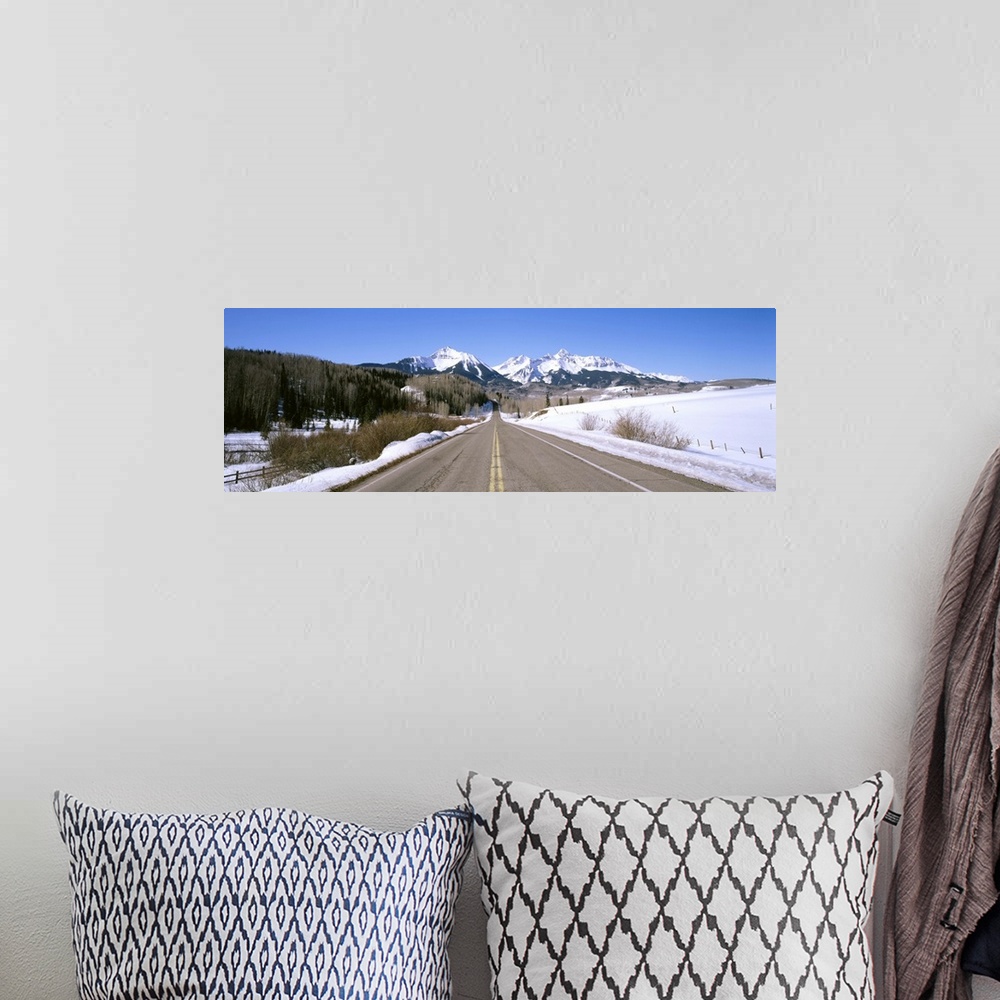 A bohemian room featuring Highway in front of snowcapped mountains, Telluride, Colorado