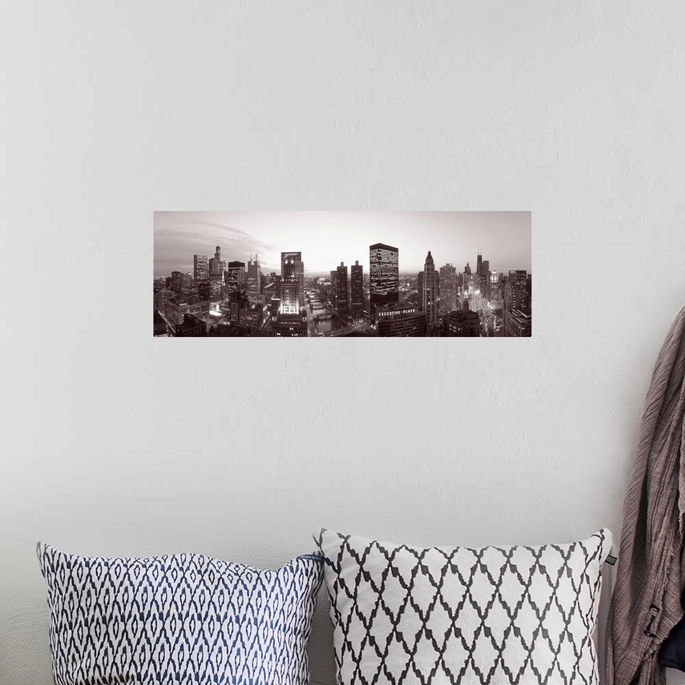 A bohemian room featuring This wide angle panoramic photograph shows this Midwestern city skyline in a monochromatic tint.