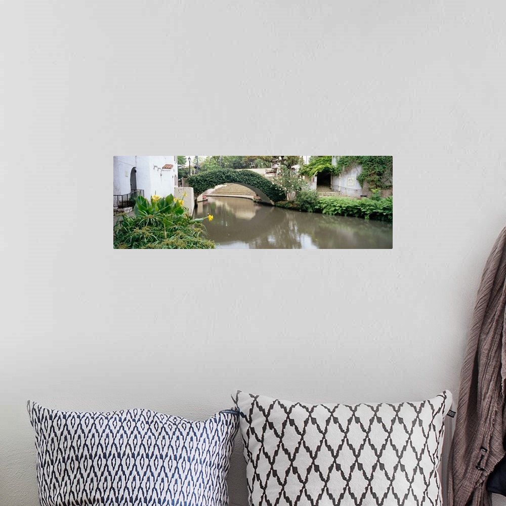 A bohemian room featuring Ivy covering a foot bridge, San Antonio River, San Antonio River Walk, San Antonio, Texas