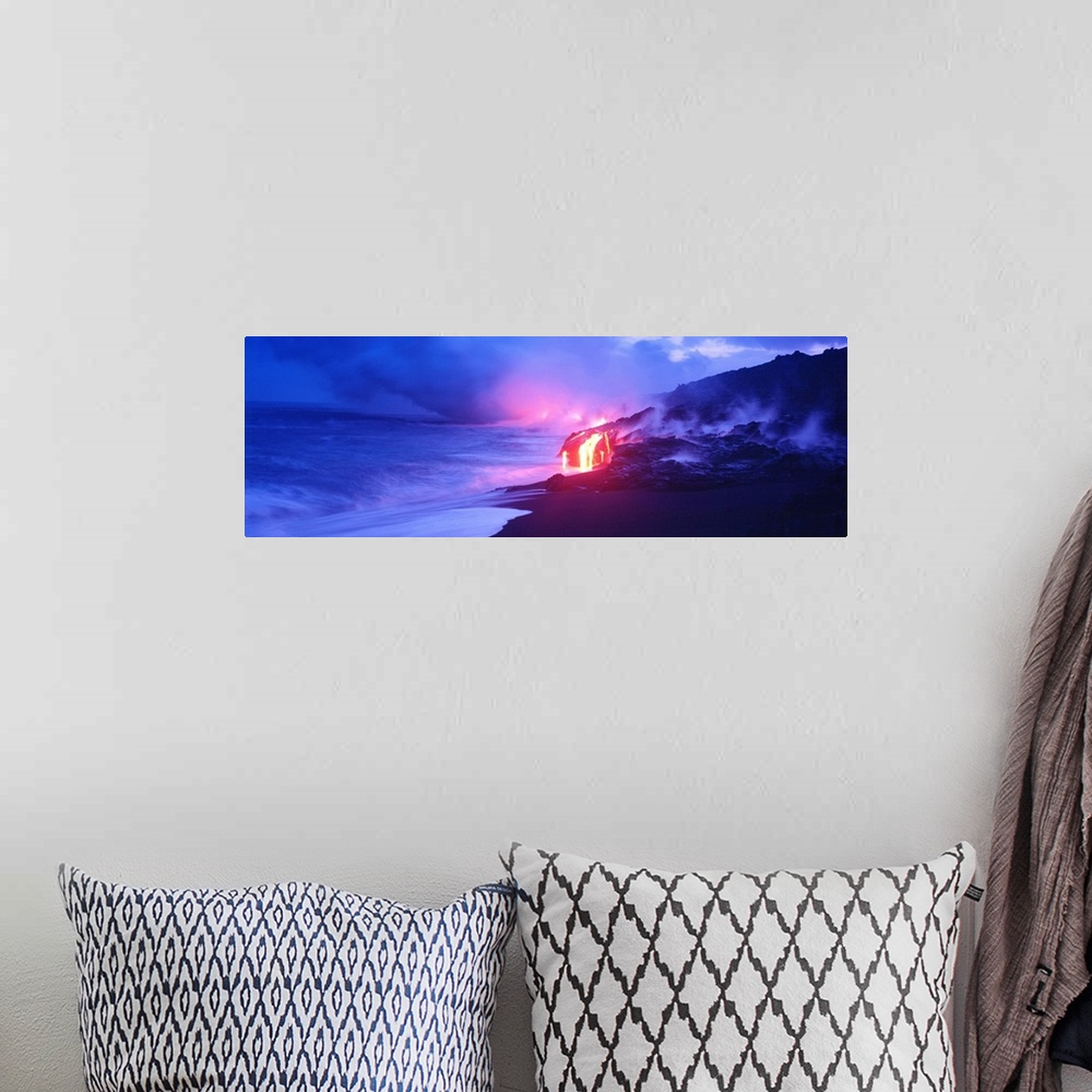 A bohemian room featuring This panoramic photograph was taken at twilight and focuses on the glowing magma as it meets the ...