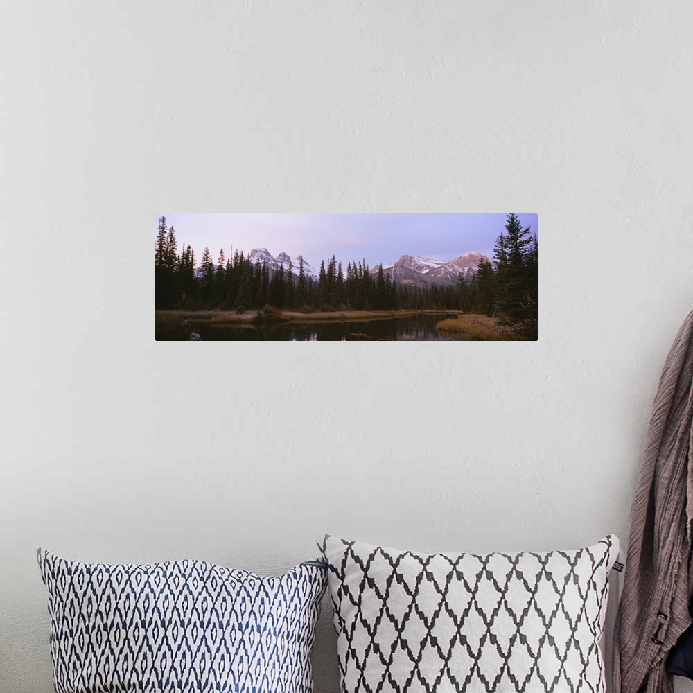 A bohemian room featuring Lake in a forest, Three Sisters Mountain, Mt Lawrence Grassi, Bow Valley, Canmore, Alberta, Canada