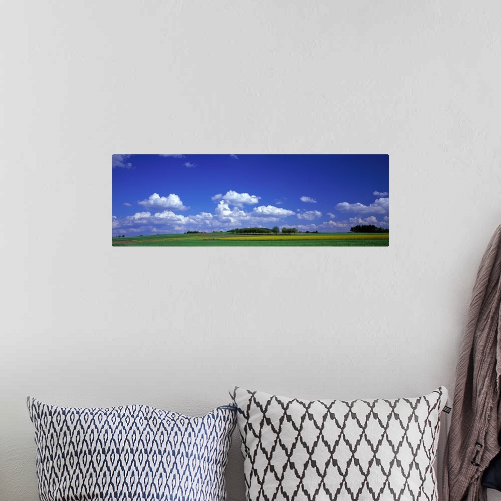 A bohemian room featuring Landscape with Clouds, near Frankfurt, Germany