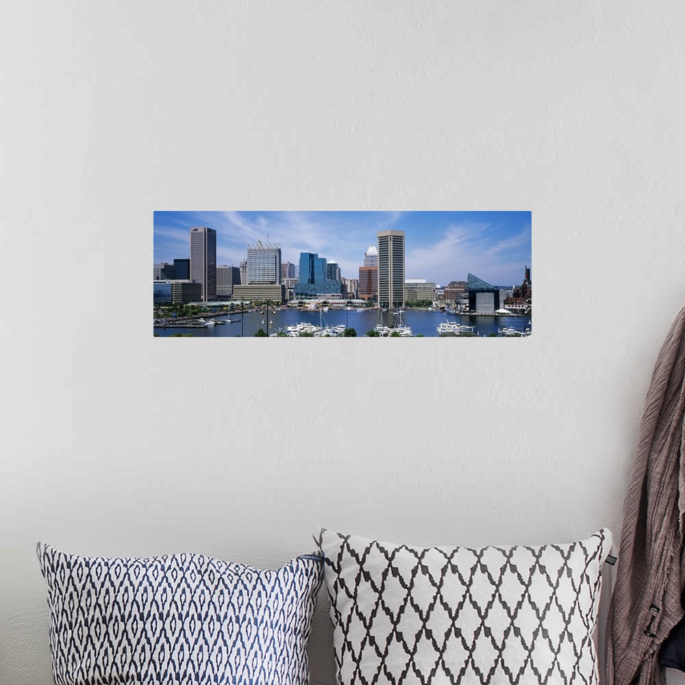 A bohemian room featuring Panoramic photograph showcases the skyline of a large city within the Northeastern United States ...