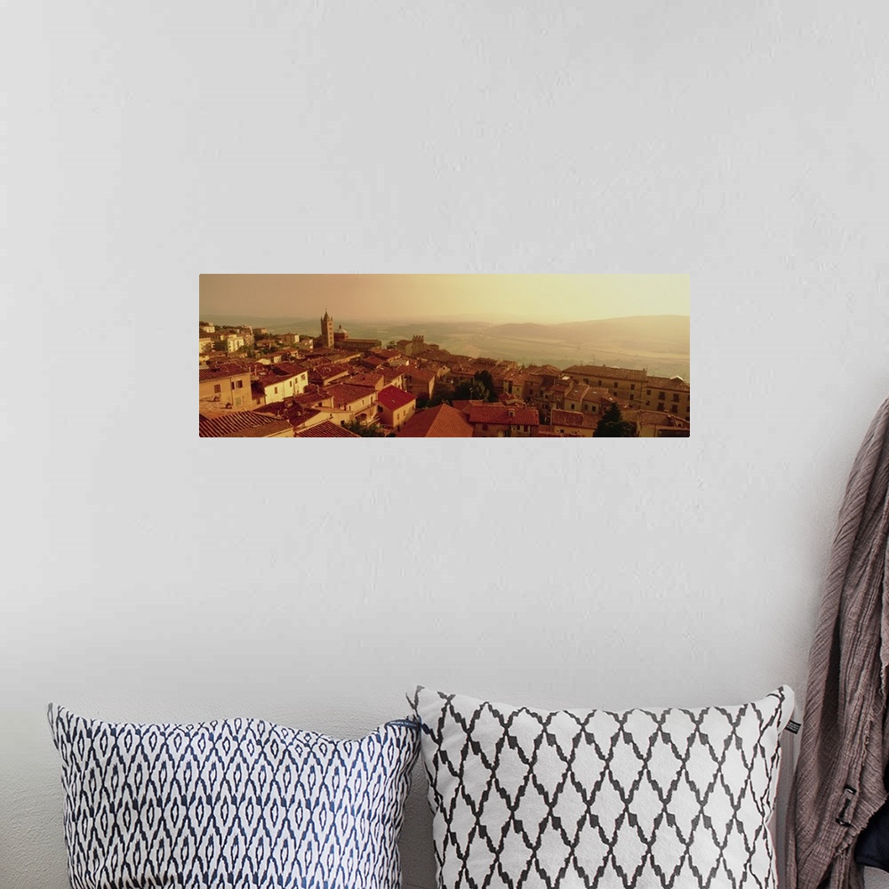 A bohemian room featuring Decorative artwork perfect for the home that is a panoramic photograph taken of a town in Italy a...