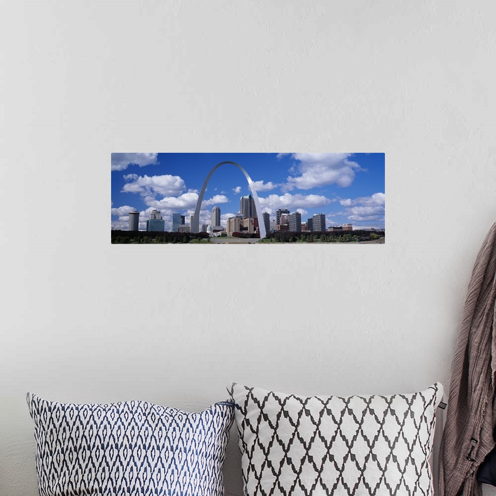 A bohemian room featuring Panoramic skyline of St. Louis, Missouri featuring in the center the Gateway Arch.