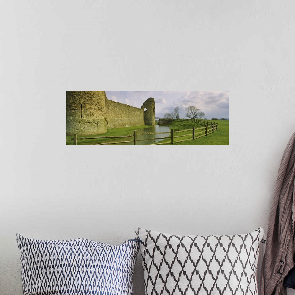 A bohemian room featuring Moat surrounding a castle, Pevensey Castle, Pevensey, Sussex, England