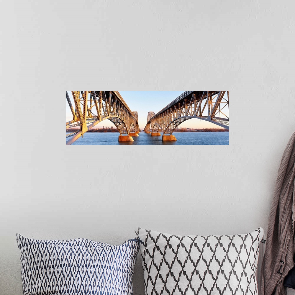 A bohemian room featuring New York, South Grand Island Bridges