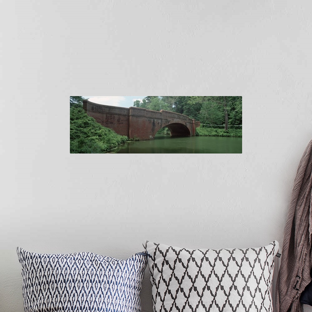 A bohemian room featuring North Carolina, Asheville, View of a red brick arched bridge over river