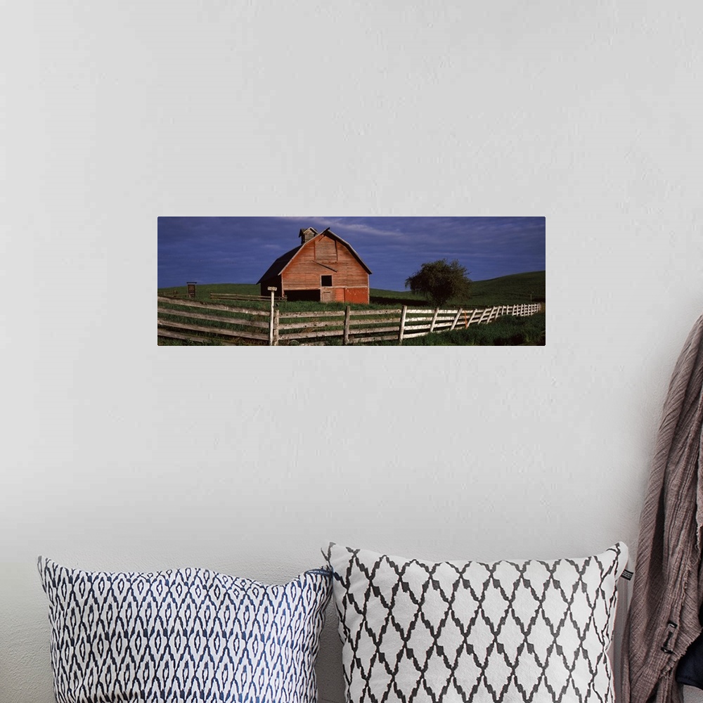 A bohemian room featuring Old barn with a fence in a field, Palouse, Whitman County, Washington State,