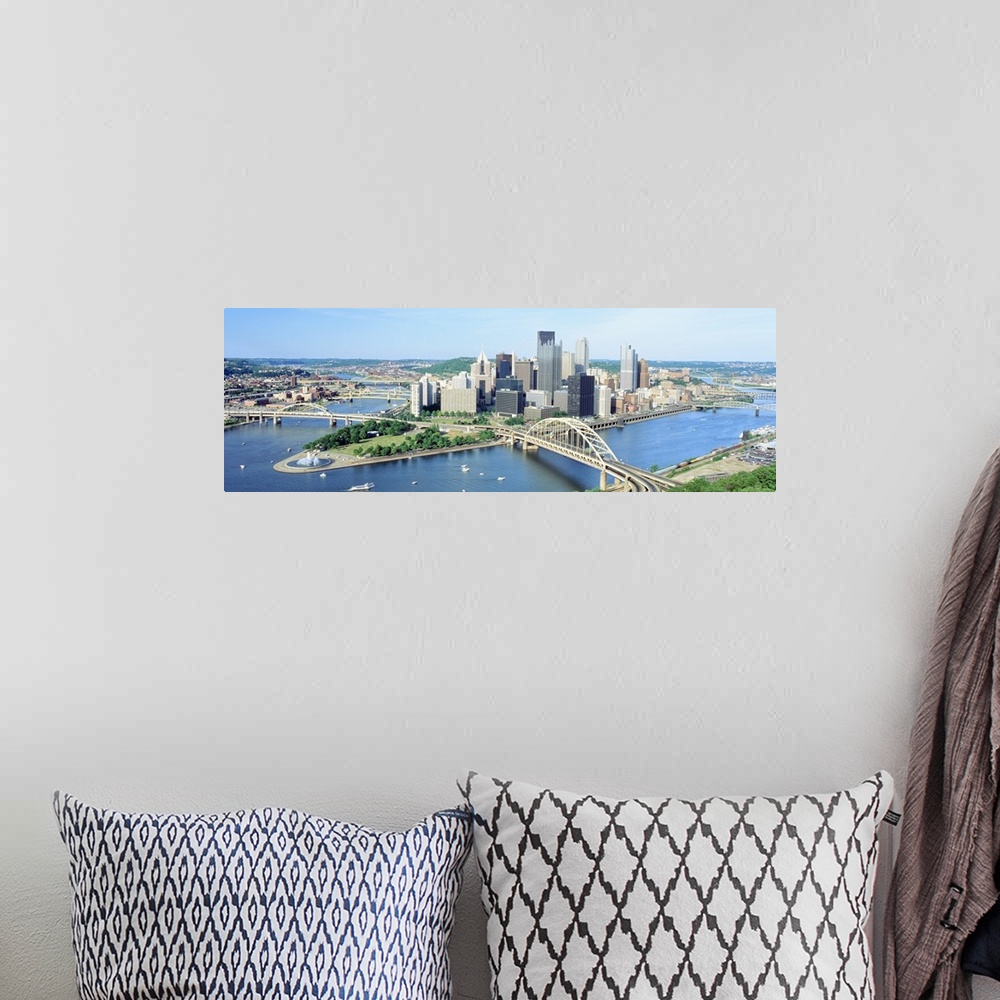 A bohemian room featuring Panoramic photograph taken from an aerial view overlooking a busy skyline in the Northeastern Uni...