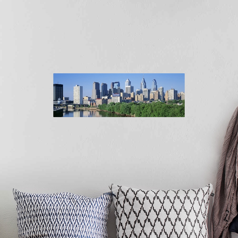A bohemian room featuring Panoramic photograph taken of downtown Philadelphia on a sunny day.