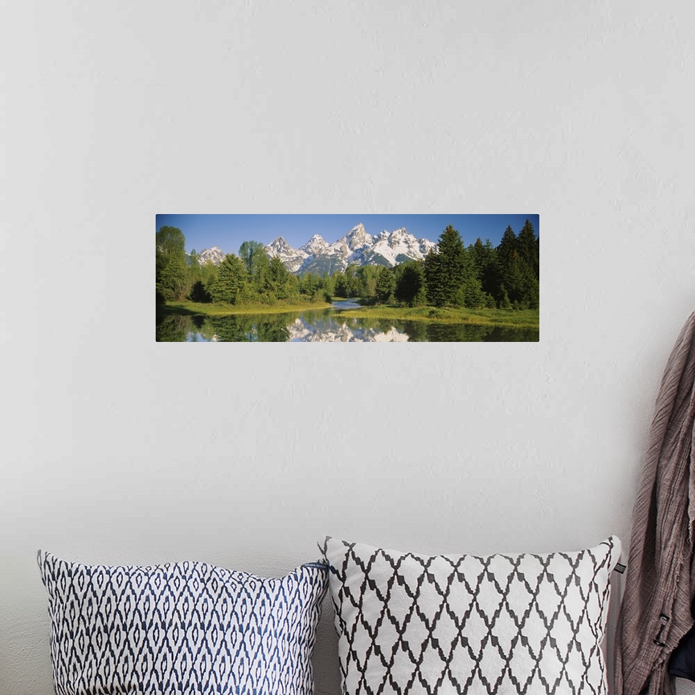 A bohemian room featuring Reflection of a snowcapped mountain in water, Near Schwabachers Landing, Grand Teton National Par...