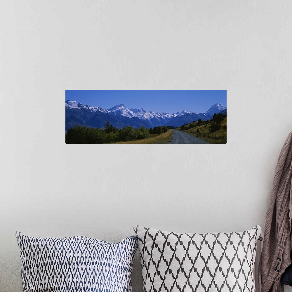 A bohemian room featuring Road running through a landscape, Mt Cook, Southern Alps, New Zealand