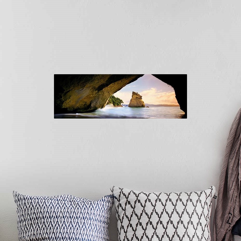 A bohemian room featuring Rock formations in the Pacific Ocean, Cathedral Cove, New Zealand