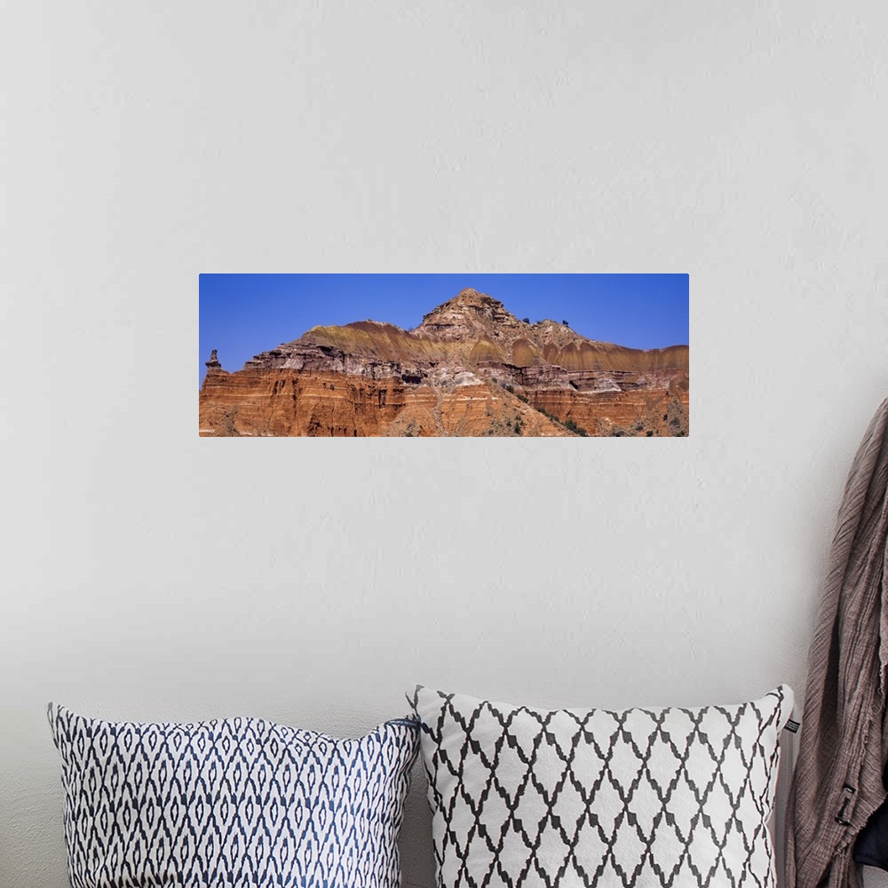 A bohemian room featuring Rock formations on a landscape, Palo Duro Canyon State Park, Texas,