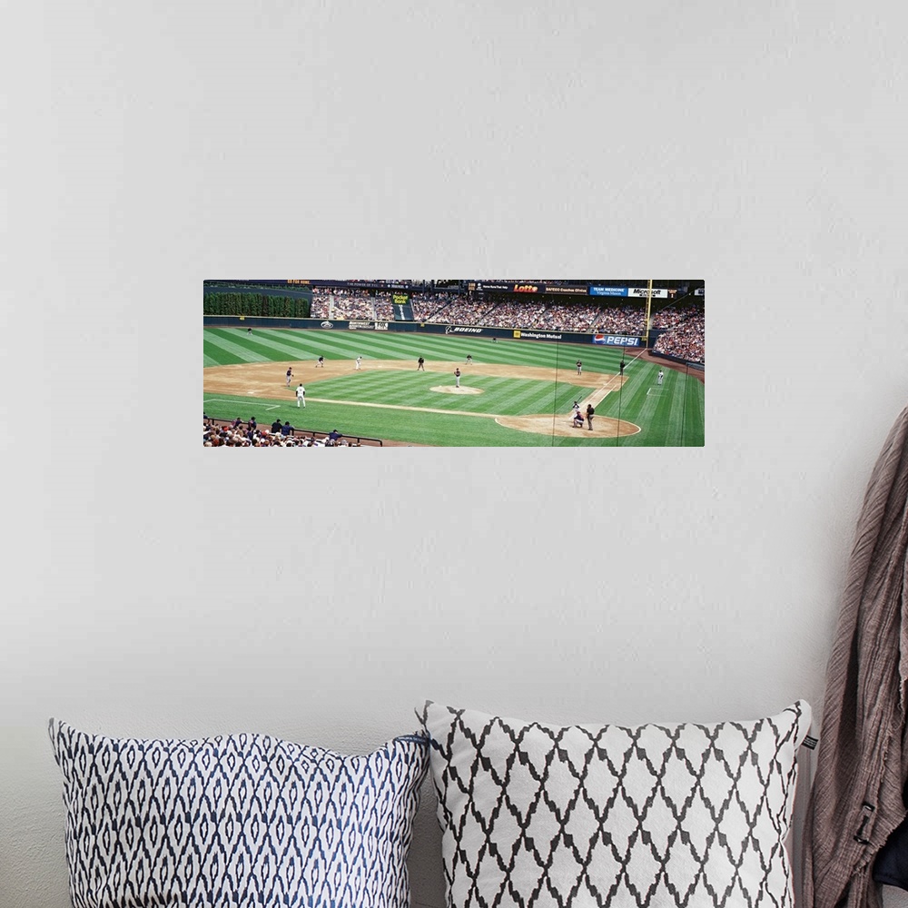 A bohemian room featuring Panoramic photograph is taken inside the Seattle Mariners baseball stadium as they play a game an...