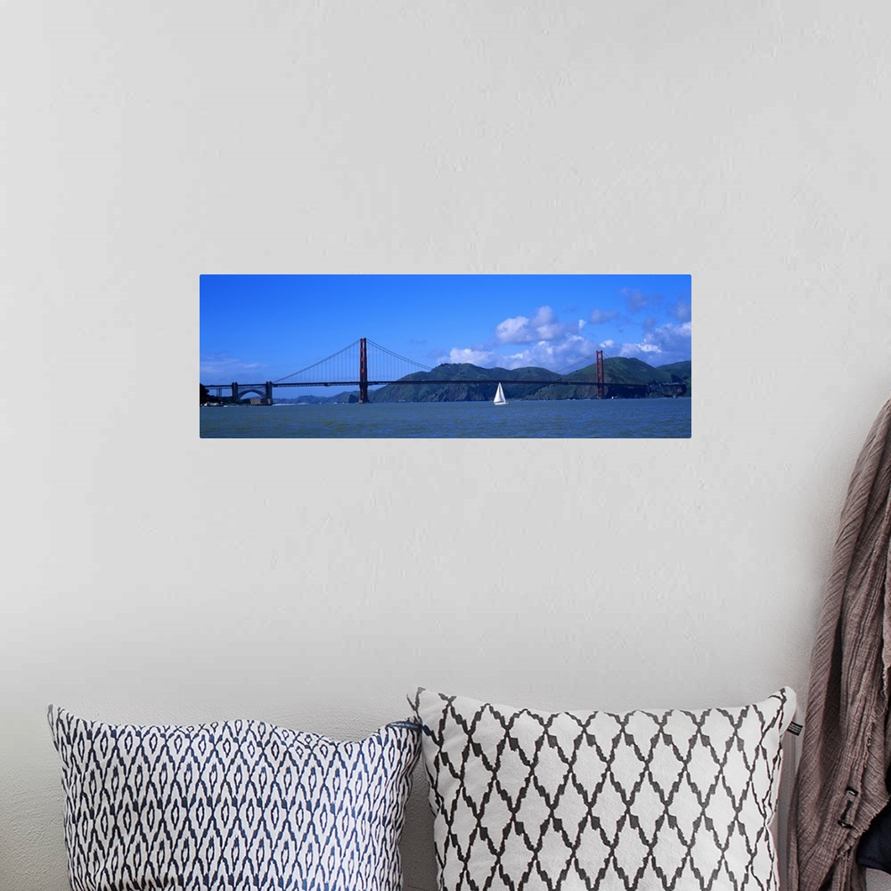 A bohemian room featuring Sailboat near a bridge, Golden Gate Bridge, San Francisco, California